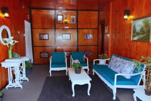 Posezení v ubytování Heavenly Home Inn