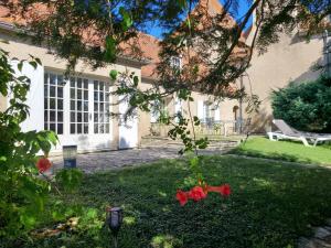Vonkajšia záhrada v ubytovaní Chambres d'hôtes Domaine des Formes
