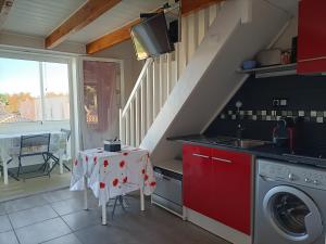 Dapur atau dapur kecil di L'Appart de Karine et Nico