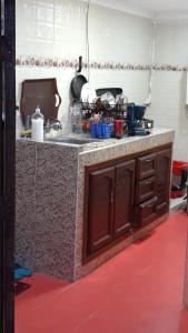 a kitchen with a sink and a counter top at Tanger in Tangier