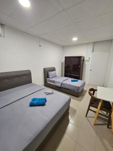 Postel nebo postele na pokoji v ubytování SS HOSTEL PENANG