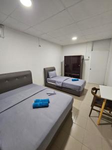 Postel nebo postele na pokoji v ubytování SS HOSTEL PENANG