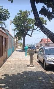 a car parked on the side of a street at Casa aconchegante beira mar in Mongaguá