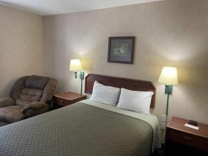 Postel nebo postele na pokoji v ubytování Hotel Yuma