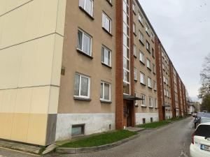 an empty street next to a building at Jalaka 2- bedroom apartment 4 beds free parking in Tartu