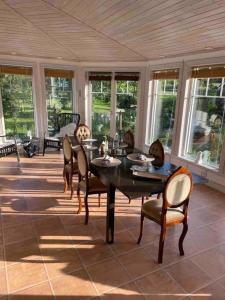 Posezení v ubytování Harmonisk Villa + 37 fotografií