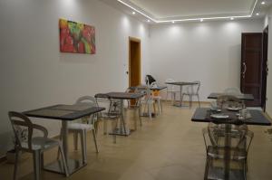 Reštaurácia alebo iné gastronomické zariadenie v ubytovaní Agriturismo Casa del Peperoncino