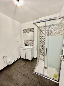 a bathroom with a shower and a sink at Magnificent apart Paris Bagnolet 402 with view in Bagnolet