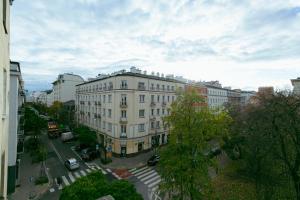 an aerial view of a building in a city at Wspólna 54a - free Parking - Apartament dla 6 osób - 450 metrów od Dworca Centralnego i Złotych Tarasów - Better Rental in Warsaw