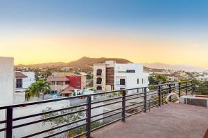 a view of a city from a balcony at Law's Paradise Pool Residence in San José del Cabo