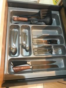 a drawer filled with utensils and utensils sidx sidx sidx sidx sidx at S.K PLAZA in East Legon
