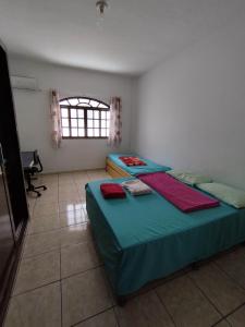 Giường trong phòng chung tại Seu Apto na Praia da Costa 1 Todo Seu Grande Completo Centro Excelente Localização