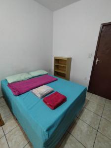 Giường trong phòng chung tại Seu Apto na Praia da Costa 1 Todo Seu Grande Completo Centro Excelente Localização