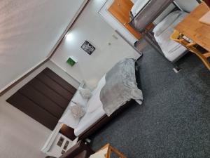 מיטה או מיטות בחדר ב-Haiminger Hof