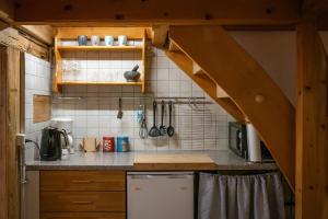 Kuchyň nebo kuchyňský kout v ubytování Chalet Elza