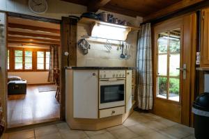 Kuchyň nebo kuchyňský kout v ubytování Chalet Elza