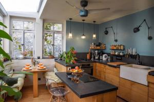 Kuchyň nebo kuchyňský kout v ubytování MAISON 2 Chambres, PATIO TERRASSE