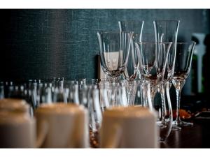 a group of wine glasses sitting on a table at VILLA KOSHIDO KOTONI - Vacation STAY 49521v in Sapporo +15 photos