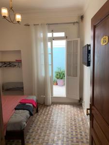 Postel nebo postele na pokoji v ubytování AFRIC HOTEL- Casbah