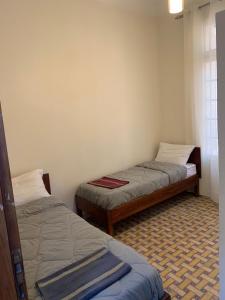 Postel nebo postele na pokoji v ubytování AFRIC HOTEL- Casbah