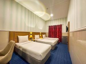 Postel nebo postele na pokoji v ubytování TAMARIND HOTEL + 37 fotografií