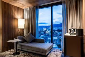 Postel nebo postele na pokoji v ubytování Hilton Bogota Corferias