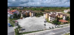 an aerial view of a large parking lot in a city at room in 2bedroom apartment, white Sands, Bavaro in Punta Cana