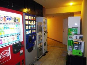 a coca cola machine in a store with at HOTEL SEAGULL - Vacation STAY 86796v in Izumi-Sano