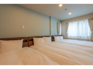 מיטה או מיטות בחדר ב-VILLA KOSHIDO KOTONI annex - Vacation STAY 97680v