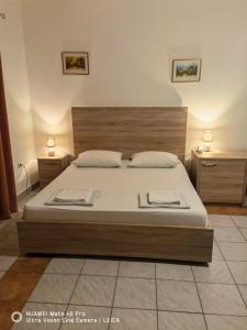 Postel nebo postele na pokoji v ubytování Lovely Bosnian Home