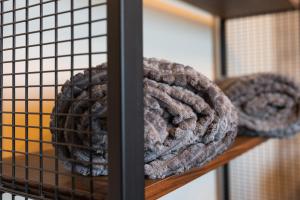 a coil of rope sitting on a shelf at Dervent Apartment in Veliko Tŭrnovo