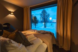 Voodi või voodid majutusasutuse Aera - Glass cabins toas