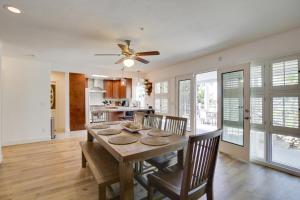 a kitchen and dining room with a table and chairs at San Diego Home Private Outdoor Pool and Game Room! in San Diego