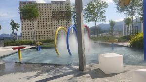 a water park with slides in the water at Urban Suites JSW GEORGETOWN PENANG, MALAYSIA in Jelutong