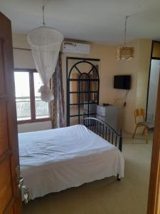 Φωτογραφία από το άλμπουμ του Pied a terre in Ouakam σε Ouakam