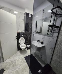 Vonios kambarys apgyvendinimo įstaigoje Moon Reflexes Apartment
