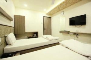TV a/nebo společenská místnost v ubytování Hotel City Inn