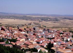 a small town with red roofs and houses at Apartamento rural en bronchales, Sierra de Albarracín in Bronchales