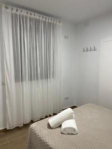 Tempat tidur dalam kamar di CASA MARTÍN