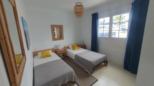 Posteľ alebo postele v izbe v ubytovaní Sea view paradise Lanzarote