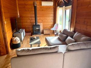 a living room with a couch and a stove at La Casa del Valle in Santa Cruz de Tenerife