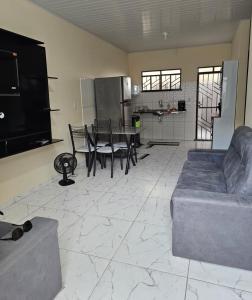 a living room with a couch and a table at Apartamento boa vista RR in Boa Vista