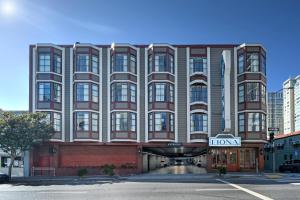 a large building with a sign that reads how at Hotel Fiona in San Francisco