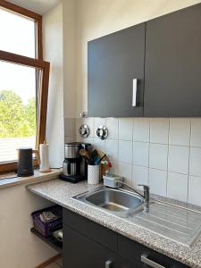 Kuchyň nebo kuchyňský kout v ubytování Wunderschönes Appartement Nahe der Berge