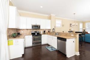 Køkken eller tekøkken på Anglers Reef Vacation Rental