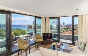 a living room with a view of the city at Arts Hotel Harbiye - Special Class in Istanbul