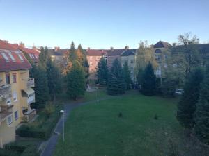 an aerial view of a yard with trees and buildings at Szófia Wellness Apartman in Nagykanizsa