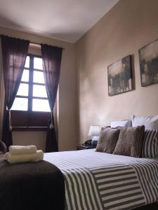Katil atau katil-katil dalam bilik di HOTEL en el CENTRO HISTORICO
