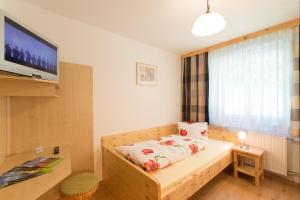 Postel nebo postele na pokoji v ubytování Haus Moser