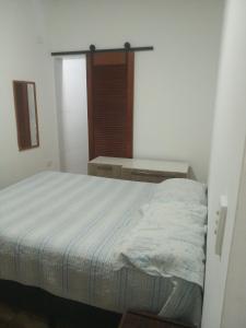 Katil atau katil-katil dalam bilik di Casa mirante Bela Vista